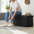 SONGMICS Taburet pliabil cu sezut moale, spatiu de depozitare 80litri, maxim 300kg, 76x38x38cm, negru