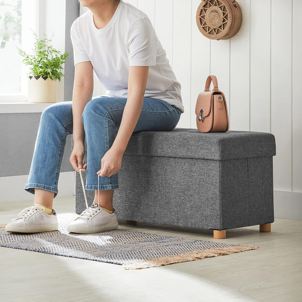 SONGMICS Taburet pliabil cu sezut moale, spatiu de depozitare, maxim 300kg, 76x38x40cm, gri inchis