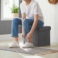 SONGMICS Taburet cu sezut moale, spatiu de depozitare, maxim 300kg, 38x38x38cm, gri inchis